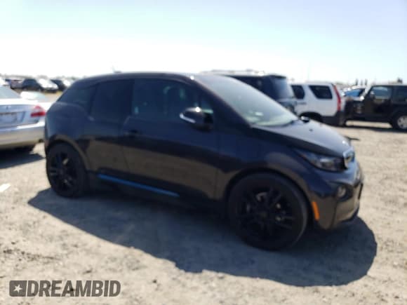 ✅ 2015 BMW i3 • VIN: WBY1Z4C5XFV278617 • Lot: 54984645. Listed on Copart with 140,868 mi. Free auction sales archive from the USA and detailed vehicle history report at DreamBid. Image 4.