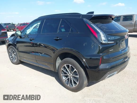 ✅ 2024 Cadillac XT4 AWD Sport • VIN: 1GYFZFR40RF222938 • Lot: 42830030. Listed on IAAI with 5,162 mi. Free auction sales archive from the USA and detailed vehicle history report at DreamBid. Image 3.