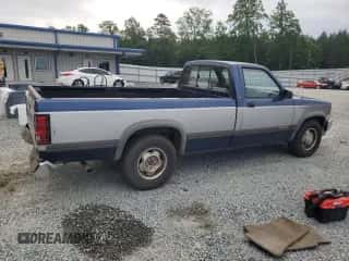 1991 Dodge Dakota S z VIN 1B7FL26Y5MS364290, wystawiony jako Copart lot #56398945 z przebiegiem 98 390 mil mil oraz Szkoda całkowita • Salvage title. Historia ofert i sprzedaży dostępna na DreamBid. Obrazek 3.