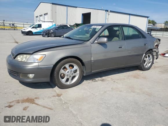 ✅ 2001 Lexus ES 300 • VIN: JT8BF28G410303237 • Lot: 81873015. Wystawiony na Copart z przebiegiem 158 016 mil. Bezpłatny archiwum sprzedaży aukcyjnych z USA i szczegółowy raport historii pojazdu na DreamBid. Zdjęcie 1.