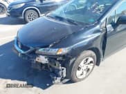 ✅ 2014 Honda Civic LX • VIN: 2HGFB2F59EH525937 • Lot: 43598619. Listed on IAAI with 174,026 mi. Free auction sales archive from the USA and detailed vehicle history report at DreamBid. Image 18.