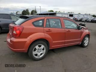 ✅ 2009 Dodge Caliber SXT • VIN: 1B3HB48A29D157571 • Лот: 71870254. Опубликован ранее на Copart с пробегом 176 514 миль. Бесплатный доступ к архиву аукционных продаж из США и подробный отчёт об истории автомобиля на DreamBid. Изображение 3.