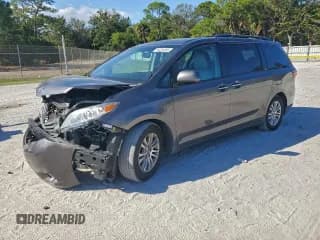 ✅ 2015 Toyota Sienna XLE • VIN: 5TDYK3DC0FS678921 • Lot: 94314055. Listed on Copart with 112,858 mi. Free auction sales archive from the USA and detailed vehicle history report at DreamBid. Image 1.