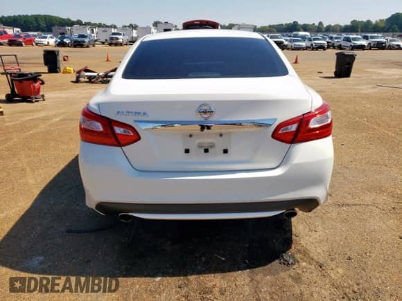 2016 Nissan Altima S с VIN 1N4AL3AP0GC163495, выставлен на аукционе Copart как лот 84620705 с пробегом 133 495 миль миль и Списание • Salvage title. История ставок и продаж доступна на DreamBid. Изображение 6.