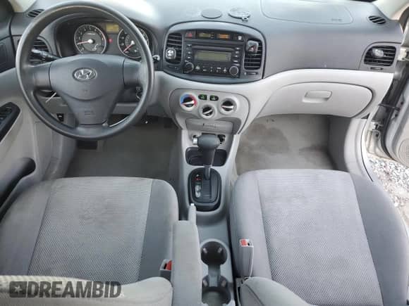 2007 Hyundai Accent GLS с VIN KMHCN46C57U143211, выставлен на аукционе Copart как лот 82157425 с пробегом 130 064 миль миль и Списание • Salvage title. История ставок и продаж доступна на DreamBid. Изображение 8.