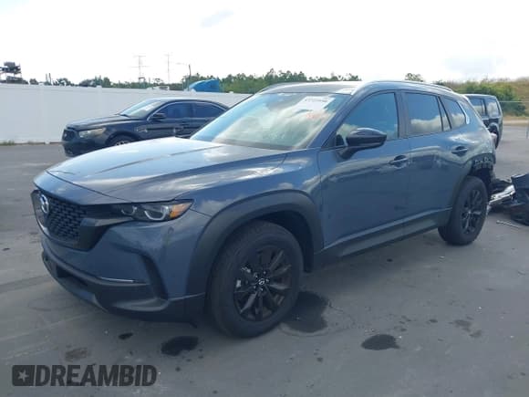 ✅ 2025 Mazda CX-50 S Preferred • VIN: 7MMVABBM1SN392085 • Lot: 43723950. Listed on IAAI with 1,452 mi. Free auction sales archive from the USA and detailed vehicle history report at DreamBid. Image 18.