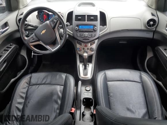 ✅ 2012 Chevrolet Sonic LTZ • VIN: 1G1JE6SH7C4123988 • Lot: 64845065. Listed on Copart with 130,139 mi. Free auction sales archive from the USA and detailed vehicle history report at DreamBid. Image 8.