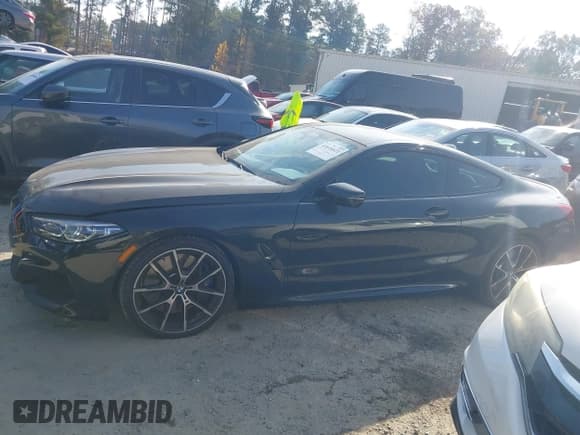 ✅ 2022 BMW 8 Series M850i xDrive • VIN: WBABC4C06NCG86571 • Lot: 43616622. Listed on IAAI with 5,383 mi. Free auction sales archive from the USA and detailed vehicle history report at DreamBid. Image 14.