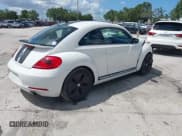 ✅ 2012 Volkswagen Beetle Turbo • VIN: 3VWVA7AT8CM666168 • Lot: 42552400. Wystawiony na IAAI z przebiegiem 81 494 mil. Bezpłatny archiwum sprzedaży aukcyjnych z USA i szczegółowy raport historii pojazdu na DreamBid. Zdjęcie 4.