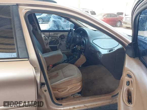 ✅ 1997 Ford Taurus GL • VIN: 1FALP57U9VG217727 • Lot: 42879165. Wystawiony na IAAI z przebiegiem 108 138 mil. Bezpłatny archiwum sprzedaży aukcyjnych z USA i szczegółowy raport historii pojazdu na DreamBid. Zdjęcie 5.