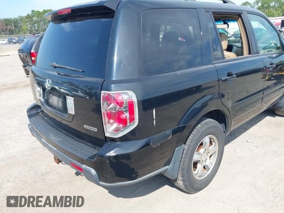 ✅ 2007 Honda Pilot EX-L • VIN: 5FNYF18667B010284 • Lot: 43232259. Listed on IAAI with 370,554 mi. Free auction sales archive from the USA and detailed vehicle history report at DreamBid. Image 6.