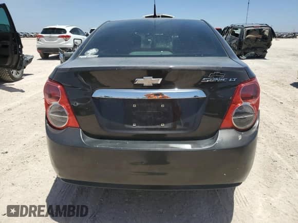 2014 Chevrolet Sonic LT с VIN 1G1JC5SH1E4122774, выставлен на аукционе Copart как лот 61878944 с пробегом Не указан миль и Списание • Salvage title. История ставок и продаж доступна на DreamBid. Изображение 6.