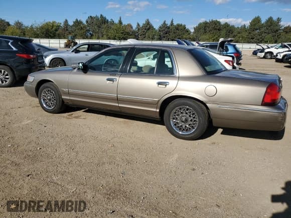 ✅ 2002 Mercury Grand Marquis GS • VIN: 2MEFM74W72X628727 • Лот: 85876915. Опубликован ранее на Copart с пробегом 211 633 миль. Бесплатный доступ к архиву аукционных продаж из США и подробный отчёт об истории автомобиля на DreamBid. Изображение 2.