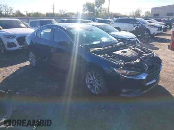 ✅ 2021 Mazda 3 Select • VIN: JM1BPABL3M1338574 • Lot: 43586559. Listed on IAAI with 89,147 mi. Free auction sales archive from the USA and detailed vehicle history report at DreamBid. Image 1.