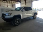 ✅ 2018 Chevrolet Colorado 4WD ZR2 • VIN: 1GCPTEE11J1188334 • Лот: 87228985. Опубликован ранее на Copart с пробегом 108 574 миль. Бесплатный доступ к архиву аукционных продаж из США и подробный отчёт об истории автомобиля на DreamBid. Изображение 1.
