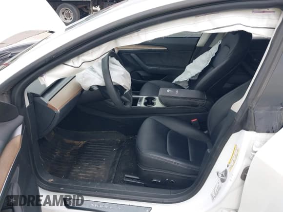 ✅ 2023 Tesla Model 3 • VIN: 5YJ3E1EA3PF563240 • Lot: 42190104. Listed on IAAI with 32,596 mi. Free auction sales archive from the USA and detailed vehicle history report at DreamBid. Image 5.