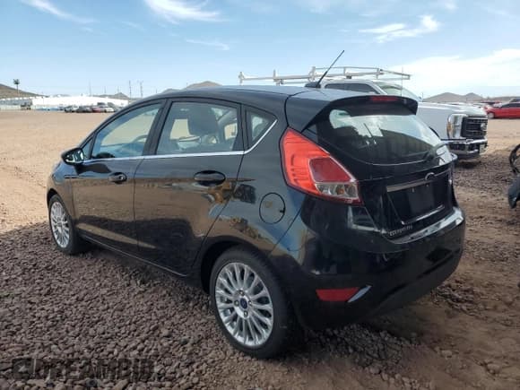 ✅ 2016 Ford Fiesta Titanium • VIN: 3FADP4FJ7GM138278 • Lot: 70993025. Wystawiony na Copart z przebiegiem 112 169 mil. Bezpłatny archiwum sprzedaży aukcyjnych z USA i szczegółowy raport historii pojazdu na DreamBid. Zdjęcie 2.