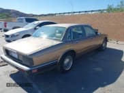 ✅ 1989 Jaguar XJ • VIN: SAJKY1548KC576361 • Lot: 42827334. Listed on IAAI with 7,914 mi. Free auction sales archive from the USA and detailed vehicle history report at DreamBid. Image 4.