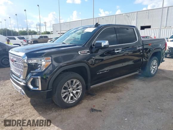 ✅ 2021 GMC Sierra 1500 Denali • VIN: 3GTU9FELXMG337175 • Lot: 43262344. Listed on IAAI with 26,877 mi. Free auction sales archive from the USA and detailed vehicle history report at DreamBid. Image 2.