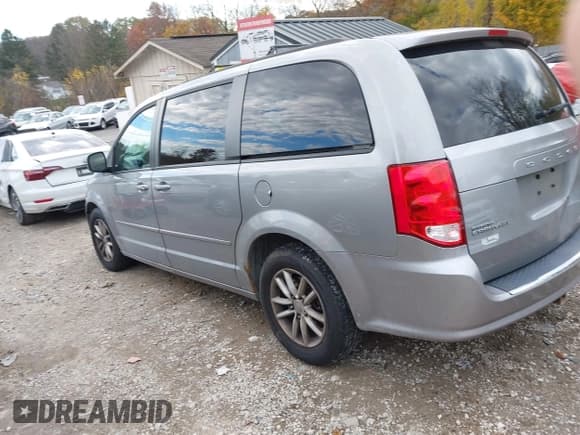 ✅ 2014 Dodge Grand Caravan SXT • VIN: 2C4RDGCG4ER393088 • Lot: 43616619. Listed on IAAI with 203,070 mi. Free auction sales archive from the USA and detailed vehicle history report at DreamBid. Image 3.