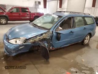 ✅ 2001 Ford Focus SE • VIN: 1FAHP36351W253014 • Lot: 70211055. Listed on Copart with 184,143 mi. Free auction sales archive from the USA and detailed vehicle history report at DreamBid. Image 1.