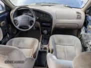 ✅ 2002 Kia Spectra • VIN: KNAFB121025197433 • Lot: 51838015. Listed on Copart with 209,660 mi. Free auction sales archive from the USA and detailed vehicle history report at DreamBid. Image 8.