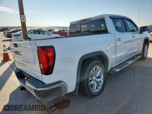 ✅ 2019 GMC Sierra 1500 SLT • VIN: 3GTP8DED7KG293646 • Лот: 84594535. Опубликован ранее на Copart с пробегом 98 507 миль. Бесплатный доступ к архиву аукционных продаж из США и подробный отчёт об истории автомобиля на DreamBid. Изображение 3.