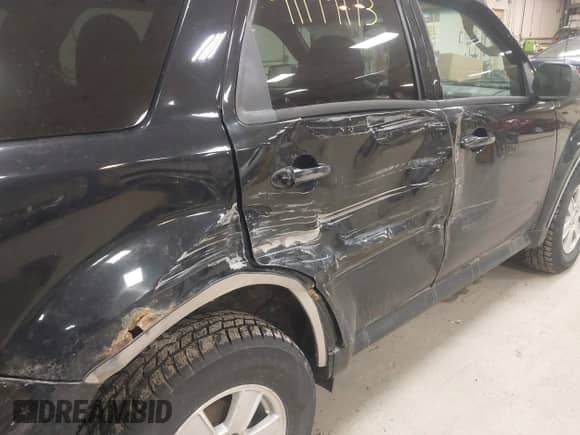 2010 Mercury Mariner with VIN 4M2CN9BG0AKJ06493, listed as a IAAI auction lot 41199173 with 143,631 mi miles and . Bid and sale history available at DreamBid. Image 6.