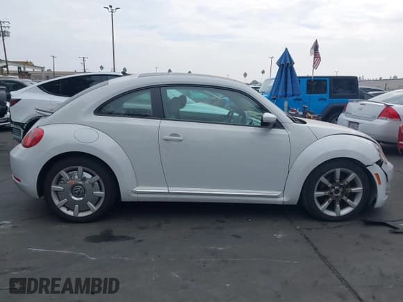 ✅ 2016 Volkswagen Beetle SE • VIN: 3VWJ17ATXGM614853 • Лот: 43628416. Опубликован ранее на IAAI с пробегом 66 179 миль. Бесплатный доступ к архиву аукционных продаж из США и подробный отчёт об истории автомобиля на DreamBid. Изображение 13.