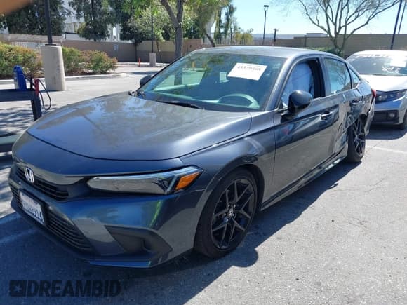 ✅ 2024 Honda Civic Sport • VIN: 2HGFE2F52RH592098 • Lot: 43379468. Listed on IAAI with 29,815 mi. Free auction sales archive from the USA and detailed vehicle history report at DreamBid. Image 2.