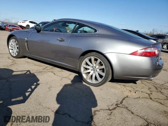 ✅ 2007 Jaguar XK • VIN: SAJWA43B575B14833 • Lot: 47523645. Listed on Copart with 134,899 mi. Free auction sales archive from the USA and detailed vehicle history report at DreamBid. Image 2.