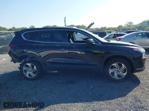 ✅ 2022 Hyundai Santa Fe SE • VIN: 5NMS1DAJ7NH441717 • Lot: 43245586. Wystawiony na IAAI z przebiegiem 52 477 mil. Bezpłatny archiwum sprzedaży aukcyjnych z USA i szczegółowy raport historii pojazdu na DreamBid. Zdjęcie 13.