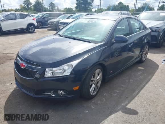 2014 Chevrolet Cruze LTZ с VIN 1G1PG5SB5E7235409, выставлен на аукционе IAAI как лот 43376675 с пробегом 129 281 миль миль и . История ставок и продаж доступна на DreamBid. Изображение 2.