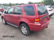 ✅ 2007 Ford Escape XLT • VIN: 1FMCU93127KA41475 • Lot: 43242854. Listed on IAAI with 144,069 mi. Free auction sales archive from the USA and detailed vehicle history report at DreamBid. Image 3.