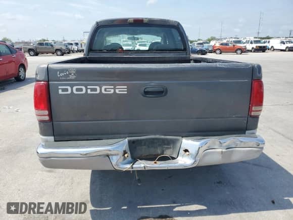 2002 Dodge Dakota SLT z VIN 1B7HL48X52S688636, wystawiony jako Copart lot #53062325 z przebiegiem 224 011 mil mil oraz Szkoda całkowita • Salvage title. Historia ofert i sprzedaży dostępna na DreamBid. Obrazek 6.