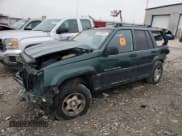 ✅ 1997 Jeep Grand Cherokee Laredo • VIN: 1J4GZ58S5VC720174 • Лот: 44169635. Опубликован ранее на Copart с пробегом Не указан. Бесплатный доступ к архиву аукционных продаж из США и подробный отчёт об истории автомобиля на DreamBid. Изображение 1.