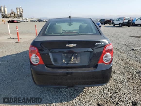 ✅ 2016 Chevrolet Sonic LS • VIN: 1G1JB5SG9G4165661 • Lot: 65093875. Listed on Copart with 137,247 mi. Free auction sales archive from the USA and detailed vehicle history report at DreamBid. Image 6.