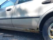 ✅ 1994 Geo Prizm • VIN: 1Y1SK5360RZ023928 • Lot: 42731486. Listed on IAAI with 229,666 mi. Free auction sales archive from the USA and detailed vehicle history report at DreamBid. Image 12.