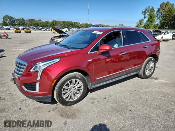 ✅ 2017 Cadillac XT5 Luxury FWD • VIN: 1GYKNBRS6HZ205429 • Lot: 81985325. Listed on Copart with 94,889 mi. Free auction sales archive from the USA and detailed vehicle history report at DreamBid. Image 1.