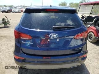 ✅ 2018 Hyundai Santa Fe 2.4L • VIN: 5XYZT3LB9JG556302 • Лот: 51242263. Опубликован ранее на Copart с пробегом 105 998 миль. Бесплатный доступ к архиву аукционных продаж из США и подробный отчёт об истории автомобиля на DreamBid. Изображение 6.