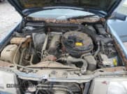 ✅ 1987 Mercedes-Benz 260 • VIN: WDBEA26D3HA496232 • Lot: 67275325. Wystawiony na Copart z przebiegiem 140 139 mil. Bezpłatny archiwum sprzedaży aukcyjnych z USA i szczegółowy raport historii pojazdu na DreamBid. Zdjęcie 11.