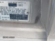 ✅ 1988 Toyota Camry • VIN: JT2SV21W4J0142371 • Lot: 41686987. Wystawiony na IAAI z przebiegiem 255 493 mil. Bezpłatny archiwum sprzedaży aukcyjnych z USA i szczegółowy raport historii pojazdu na DreamBid. Zdjęcie 9.