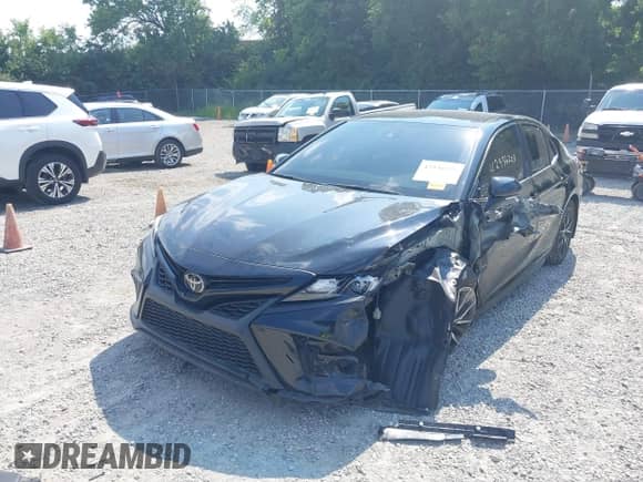 2022 Toyota Camry SE with VIN 4T1G11BK1NU053821, listed as a IAAI auction lot 42936203 with 41,547 mi miles and . Bid and sale history available at DreamBid. Image 17.
