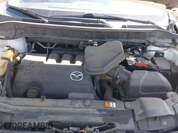 ✅ 2015 Mazda CX-9 Touring • VIN: JM3TB3CV1F0461403 • Lot: 42148325. Listed on IAAI with 143,452 mi. Free auction sales archive from the USA and detailed vehicle history report at DreamBid. Image 10.