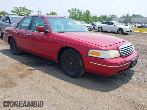 ✅ 2000 Ford Crown Victoria LX • VIN: 2FAFP74WXYX155073 • Lot: 42452890. Wystawiony na IAAI z przebiegiem 125 480 mil. Bezpłatny archiwum sprzedaży aukcyjnych z USA i szczegółowy raport historii pojazdu na DreamBid. Zdjęcie 1.