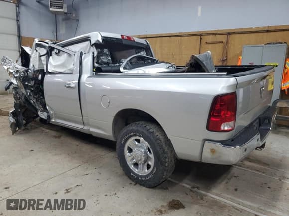 ✅ 2014 Ram 2500 SLT • VIN: 3C6TR5DT2EG121403 • Lot: 69184865. Listed on Copart with Not provided. Free auction sales archive from the USA and detailed vehicle history report at DreamBid. Image 2.