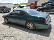 ✅ 2002 Chevrolet Monte Carlo LS • VIN: 2G1WW12E029184672 • Lot: 63994855. Listed on Copart with 68,850 mi. Free auction sales archive from the USA and detailed vehicle history report at DreamBid. Image 2.