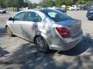 ✅ 2017 Chevrolet Sonic LS • VIN: 1G1JB5SG5H4174777 • Lot: 43215954. Listed on IAAI with 154,486 mi. Free auction sales archive from the USA and detailed vehicle history report at DreamBid. Image 3.