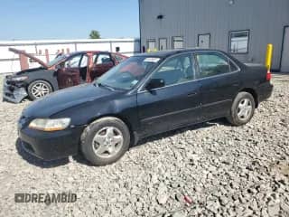 1999 Honda Accord EX with VIN 1HGCG1654XA012935, listed as a Copart auction lot 84449635 with 205,773 mi miles and Non repairable. Bid and sale history available at DreamBid. Image 1.