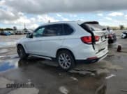 ✅ 2014 BMW X5 sDrive35i • VIN: 5UXKR2C57E0H31454 • Lot: 85766785. Listed on Copart with 137,394 mi. Free auction sales archive from the USA and detailed vehicle history report at DreamBid. Image 2.
